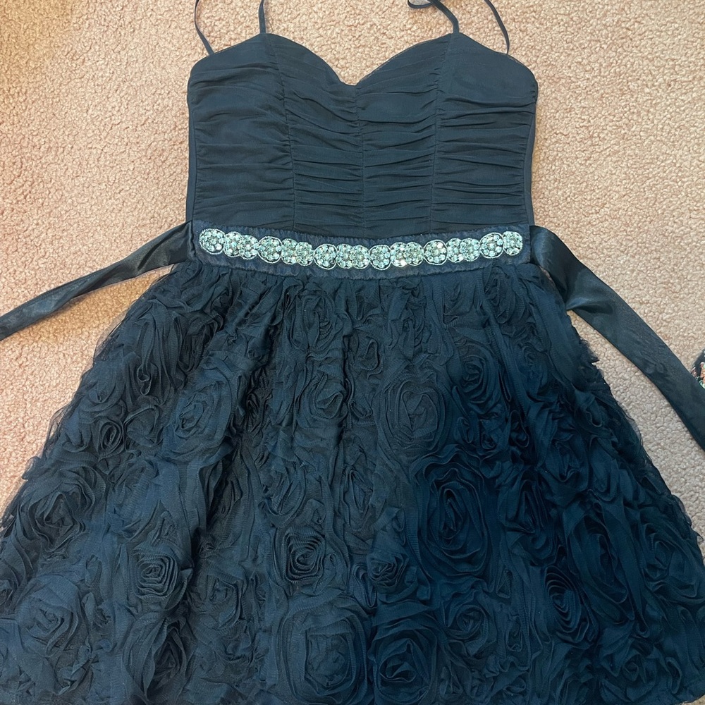 Elegant Black Strapless Dress with Floral Skirt